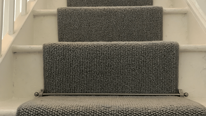 grey binded carpet with stair rods cranbrook