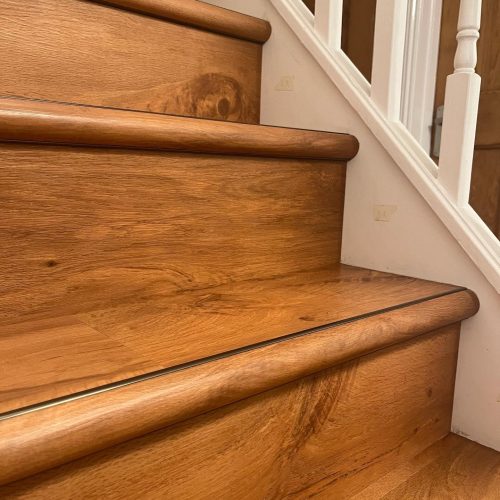 wooden stair case by todd smith carpet and flooring co